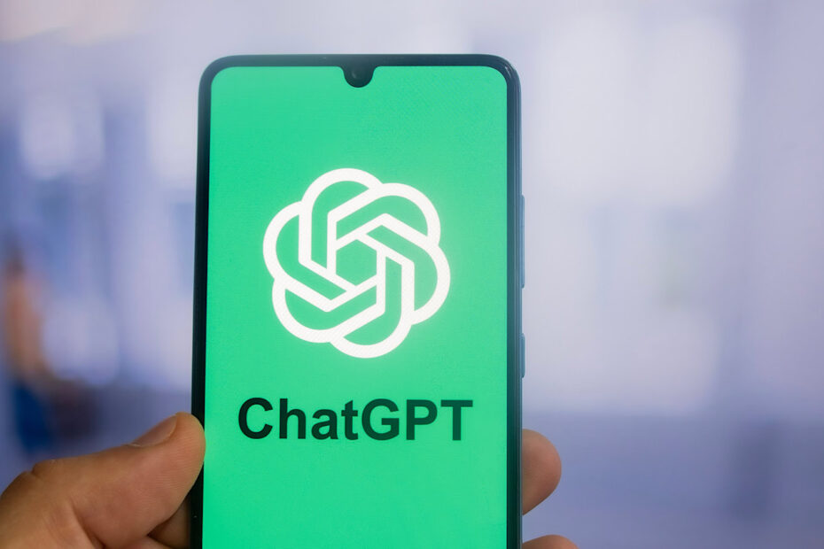 ChatGPT artificial intelligence chatbot app on smartphone screen with large shadow giving the feeling of floating on top of the background. White background.